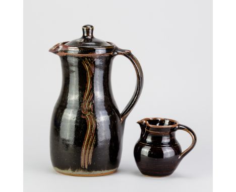 RAY FINCH (1914-2012) for Winchcombe Pottery; a stoneware coffee pot covered in tenmoku breaking to kaki glaze with combed de