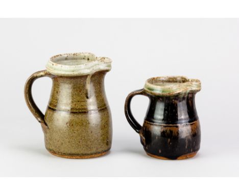 RICHARD BATTERHAM (1936-2021); a stoneware jug covered in tenmoku breaking to kaki glaze with green ash rim and interior, hei