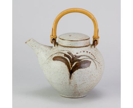 DAVID LEACH (1911-2005) for Lowerdown Pottery; a stoneware teapot with cane handle covered in speckled grey glaze with foxglo
