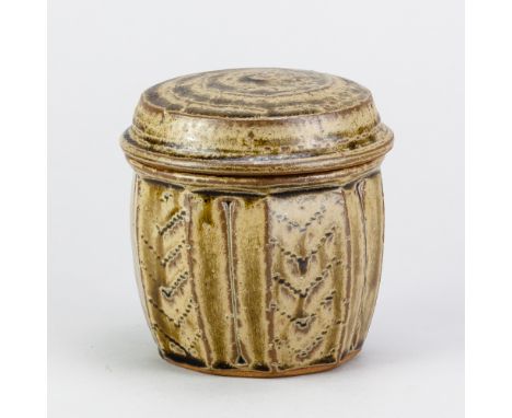 MIKE DODD (born 1943); a stoneware caddy covered in green ash and granite glaze with incised and impressed decoration, impres