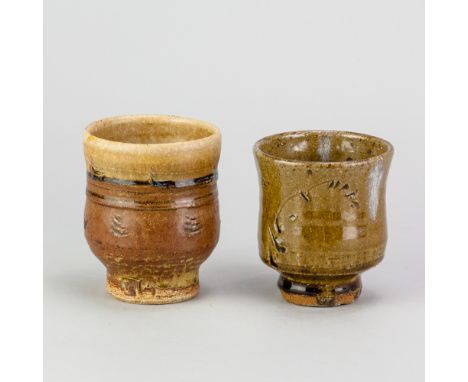 JIM MALONE (born 1946); a stoneware yunomi covered in green ash and kaki glaze with incised decoration picked out in copper b