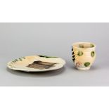 SANDY BROWN (born 1946); a stoneware plate covered in polychrome glaze, painted signature,