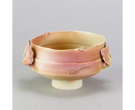 COLIN PEARSON (1923-2007); a porcelain winged bowl covered in celadon glaze with pink blushes, impressed mark, diameter 13cm 