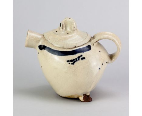 JOHANNES PETERS; a slipware teapot covered in cream slip with cobalt decoration, height 15cm. (D)JB - The second best seller 