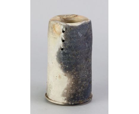 ERIC ASTOUL (born 1954); a wood fired porcelain vessel encrusted with ash and pierced with three holes, incised mark, height 