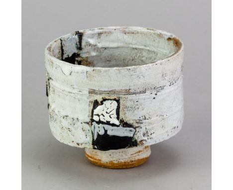 ROBIN WELCH (1936-2019); a stoneware cylindrical vessel covered in white glaze with enamel decoration, impressed RW mark, hei