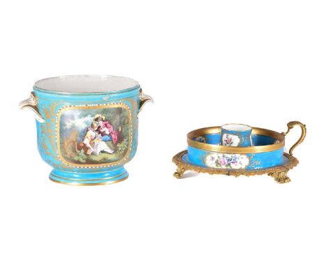 A Sevres style porcelain and gilt metal mounted inkwell,19th century, the central bulb shaped cup within a gilt metal mount w