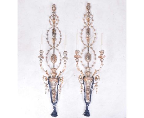 A pair of carved wood and gilt lacquered neo-classical two branch wall lights with electric flickering faux candles. 36 cm wi