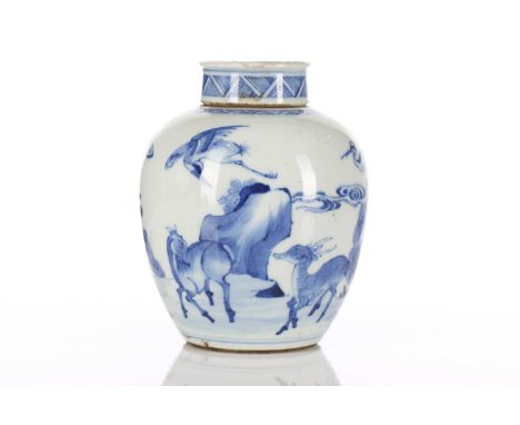 A Chinese blue &amp; white tea caddy, Qing, 18th/19th century, the lid painted with a single crane over a diaper band, the bo