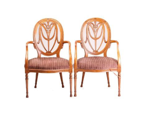 A pair of fine Adam design satinwood "Prince of Wales Feather" and cameo backed open armchairs, late 19th-century probably by