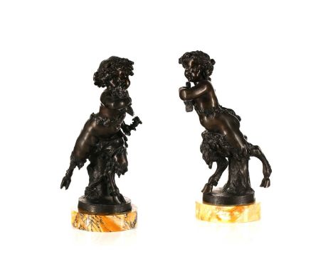 After Clodion ( Claude Michel 1738-1814), a pair of patinated bronze figures of young Nymph and Satyr, 19th century both in p