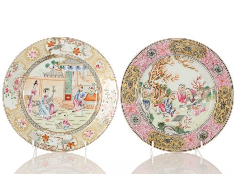 Two Chinese famille rose figural plates, possibly Republic period, painted with three seated figures playing Go within a gard