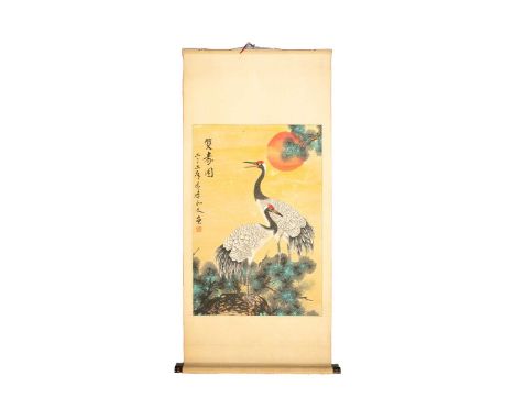 A Chinese scroll painting of two Manchurian cranes, standing on a rock before a pine tree and blazing sun, signed for Li Ru W