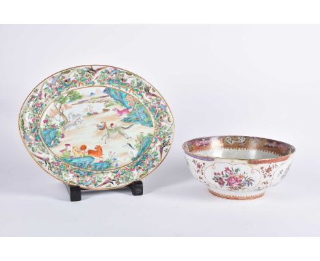 A Chinese Famile Rose porcelain oval meat plate, Qing Dynasty, mid 19th century., painted with goat, Kylin and other animals 