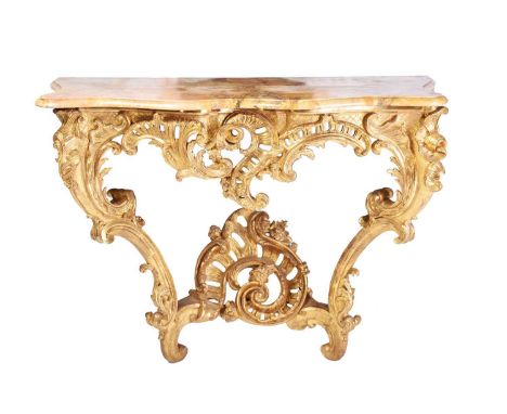 An 18th-century marble topped carved wood and gilt gesso console table with shaped cabriole supports and elaborate pierced sh