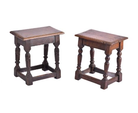 A Jacobean style oak joint stool with thumb moulded top over carved, slender cup and cover spindles united by stretchers. 45 