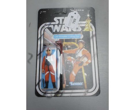 A Re-Issue Star Wars 'Luke Walker X Wing Pilot, carded.