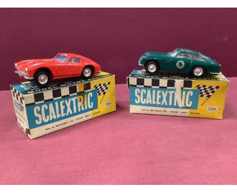 Two 1960s Scalextric Cars, No E/3 Aston Martin GT green, appears complete with some wear, one wheel inner damaged, boxed, tea