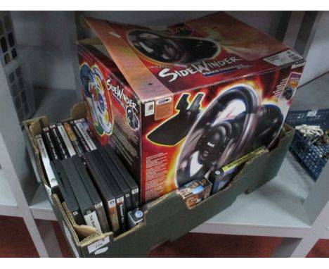 A Microsoft Sidewinder Force Feedback Wheel, untested, boxed. Together with Seventeen CD PC / DVD Games including Sim City So