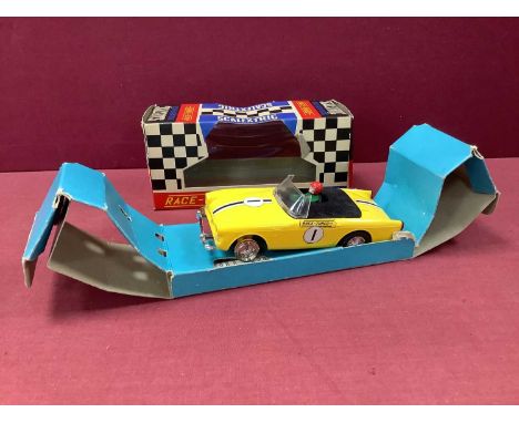 Original Race Tuned Scalextric No C/83 Sunbeam Tiger, yellow, overall appear complete, except two tyres, some wear, boxed, te