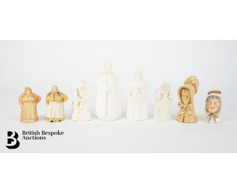 Eight Porcelain candle extinguishers, 19th century, including Royal Worcester blush-ware young woman and cook, Royal Worceste