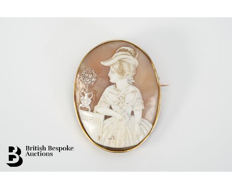 An antique 14ct gold shell cameo of a young woman, measures approx. 53 x 40mm, approx. 17.4gms (inner rim is base metal)