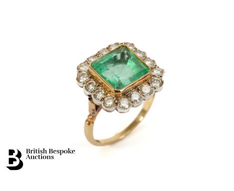 18ct white gold emerald and diamond ring. The ring set with a 5ct Columbian square-cut emerald 10 x 10mm, surrounded by sixte