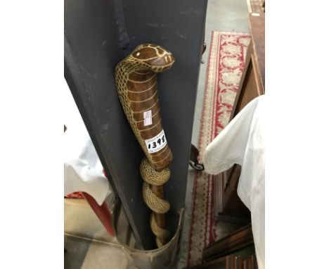 An unusual wood cobra walking stick