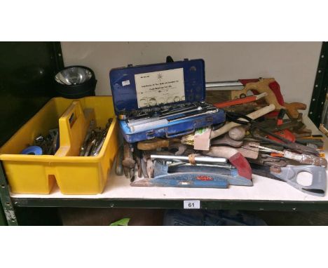 A shelf of tools, spanners, socket set etc.,