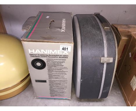 A Diamator N12 slide viewer and a Hanimex automatic slide projector, untested.