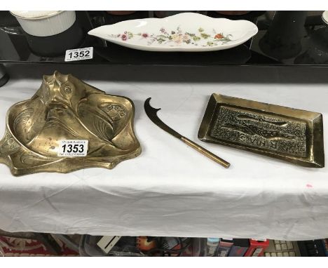 An art neuveau brass fish head inkwell, trench art pin tray &amp; letter opener