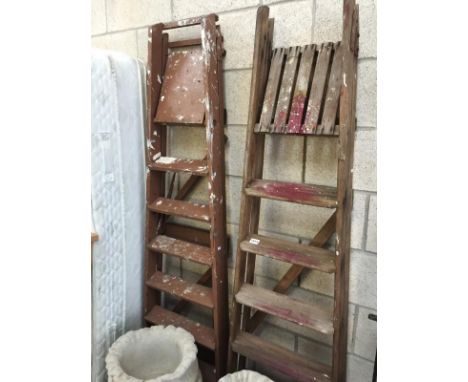 2 sets of wooden step ladders