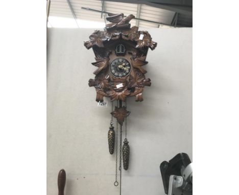 A Kaiser Quartz black front cuckoo clock