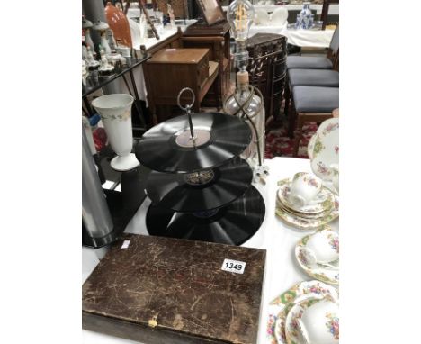 A record cake stand, soda syphon converted to a lamp &amp; cased closing machine