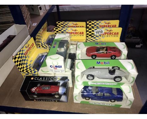 A collection of 16 boxed diecast cars including Maisto super car &amp; Mobil etc.