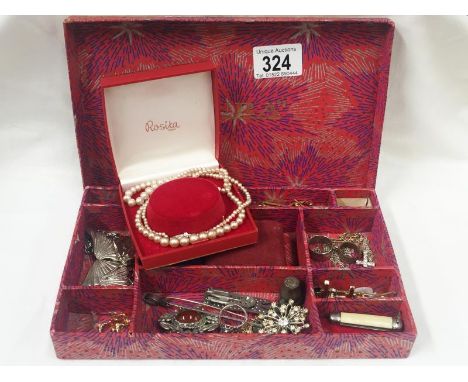 A mixed lot of costume jewellery including earrings, brooches, cuff links, tie pins, pearl necklace etc.