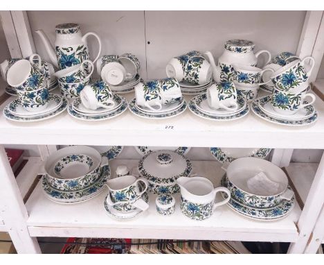 2 shelves of Midwinter Spanish Garden by Jessie Tait dinnerware