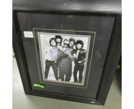 A Rolling Stones signed photograph.