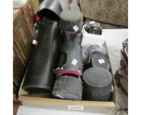 7 assorted camera lenses.