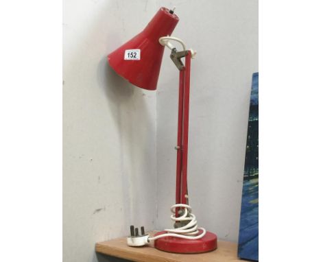 A vintage angle poise lamp
