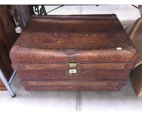 A tin trunk with makers plaque 'W. Robinson, Ironmonger, Scunthorpe'