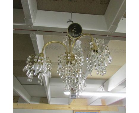 A 3 lamp chandelier.