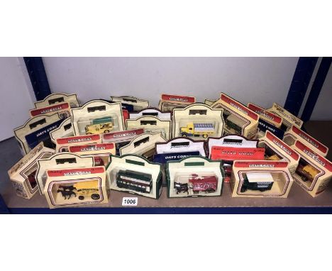 A shelf of approximately 40 Lledo, 'days gone' boxed diecast models