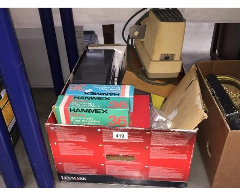 A slide projector and a large collection of slides (2 boxes)