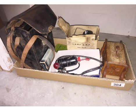 A vintage Vario camera, life jacket light, ARP torch etc.