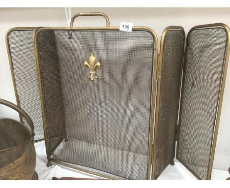 A brass 5 fold fire screen / spark guard