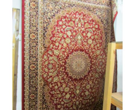 A red ground Keshan carpet, 230 x 160 cm.