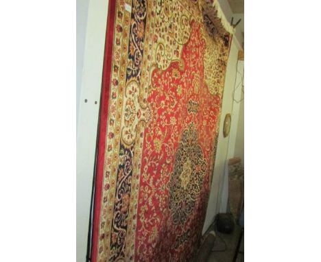 A red ground Keshan carpet, 280 x 200 cm.