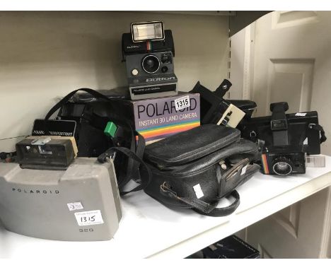 7 Polaroid cameras including a Polaroid mini portrait camera