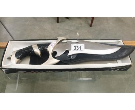 A hunting knife with stainless steel blade.